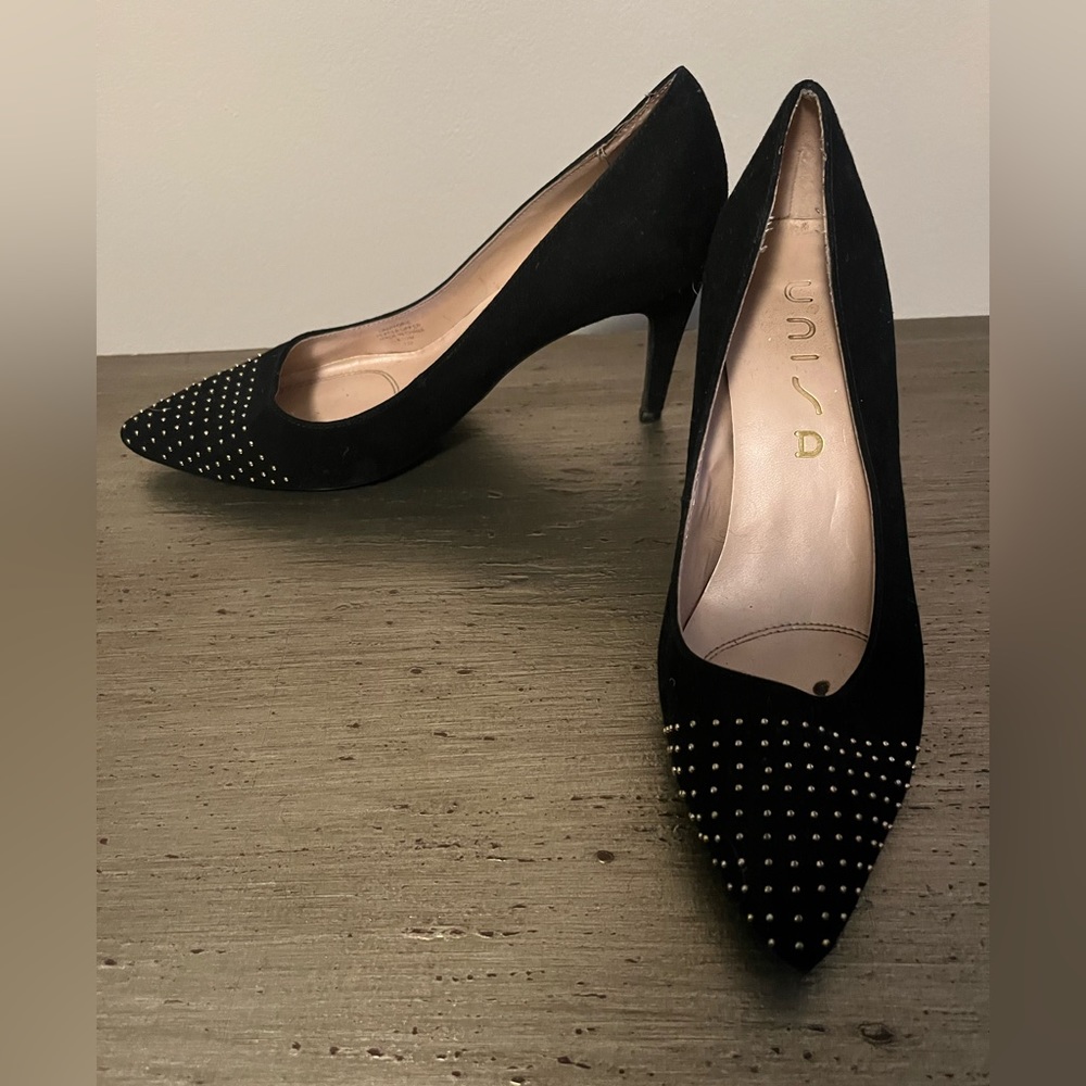 Black heels with gold detail, size 6.5